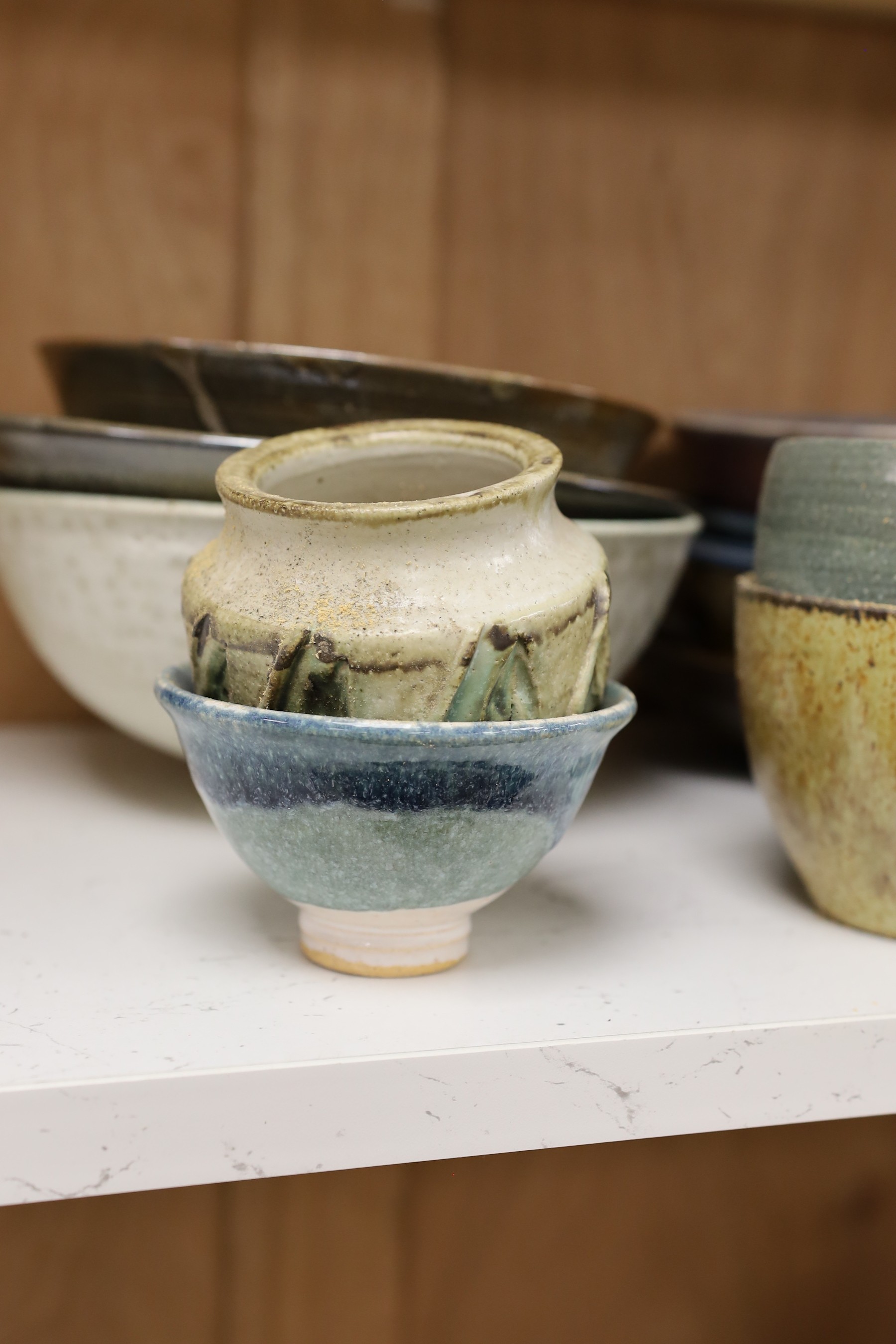 A large quantity of British studio pottery bowls and dishes, to include a vast amount by Susan Threadgold